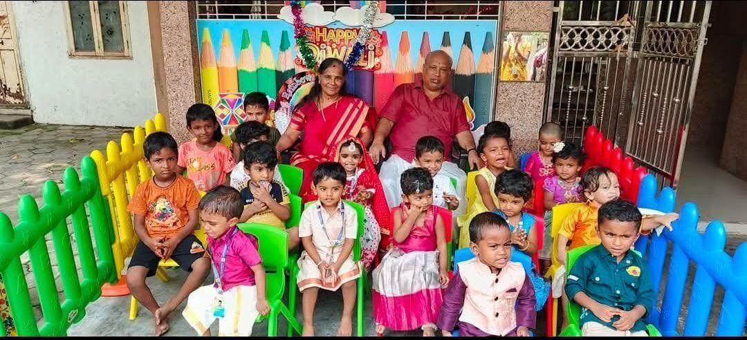 Smiling Rainbows children and teachers together during a hands-on festive celebration, learning beyond books and worksheets