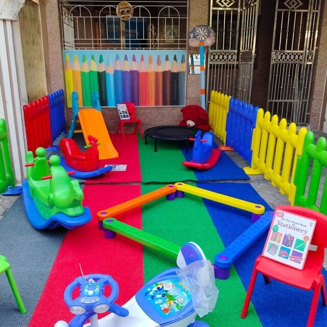 Outdoor play area at Smiling Rainbows